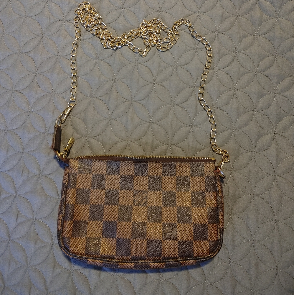 Authentic Louis Vuitton mini pochette